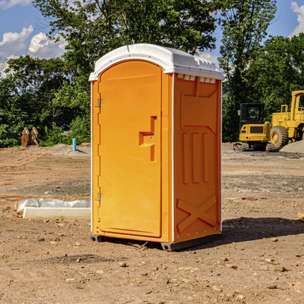 how often are the porta potties cleaned and serviced during a rental period in Dawson